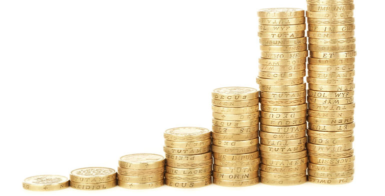 photo of stacks of pound coins