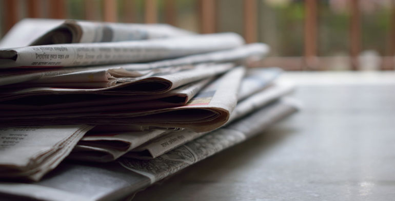 photo of stack of papers, newspapers