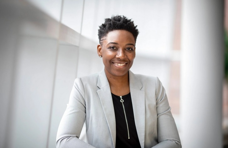 Professional woman in smart grey suit